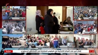 مراسل  الإخباریة السوریة فی حمص شیرین العلی من منطقة تلکلخ  ونقل أجواء سیر العملیة الانتخابیة
