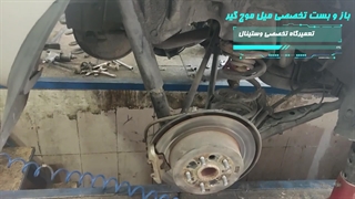 تعویض تخصصی میل موج گیر خودروی x33 در تعمیرگاه تخصصی کاراک